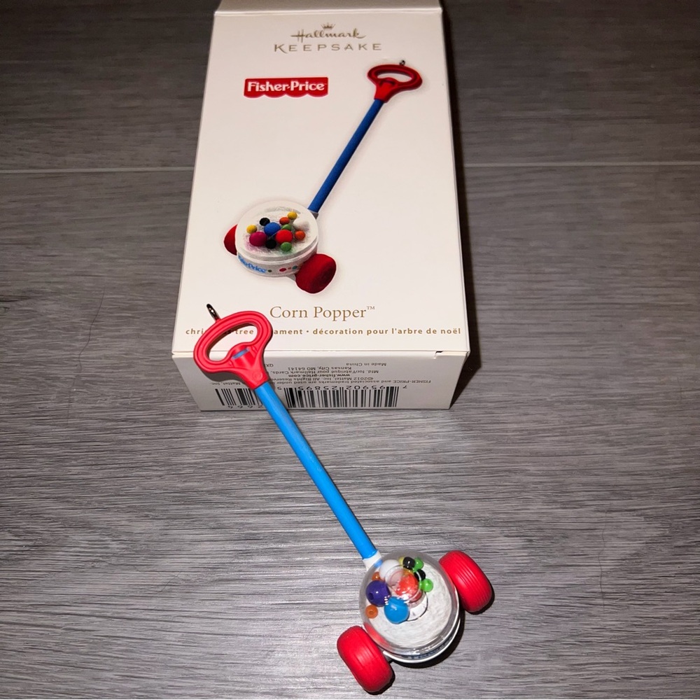 2012 Hallmark Keepsake Ornament Fisher Price Corn Popper Toy Ornament